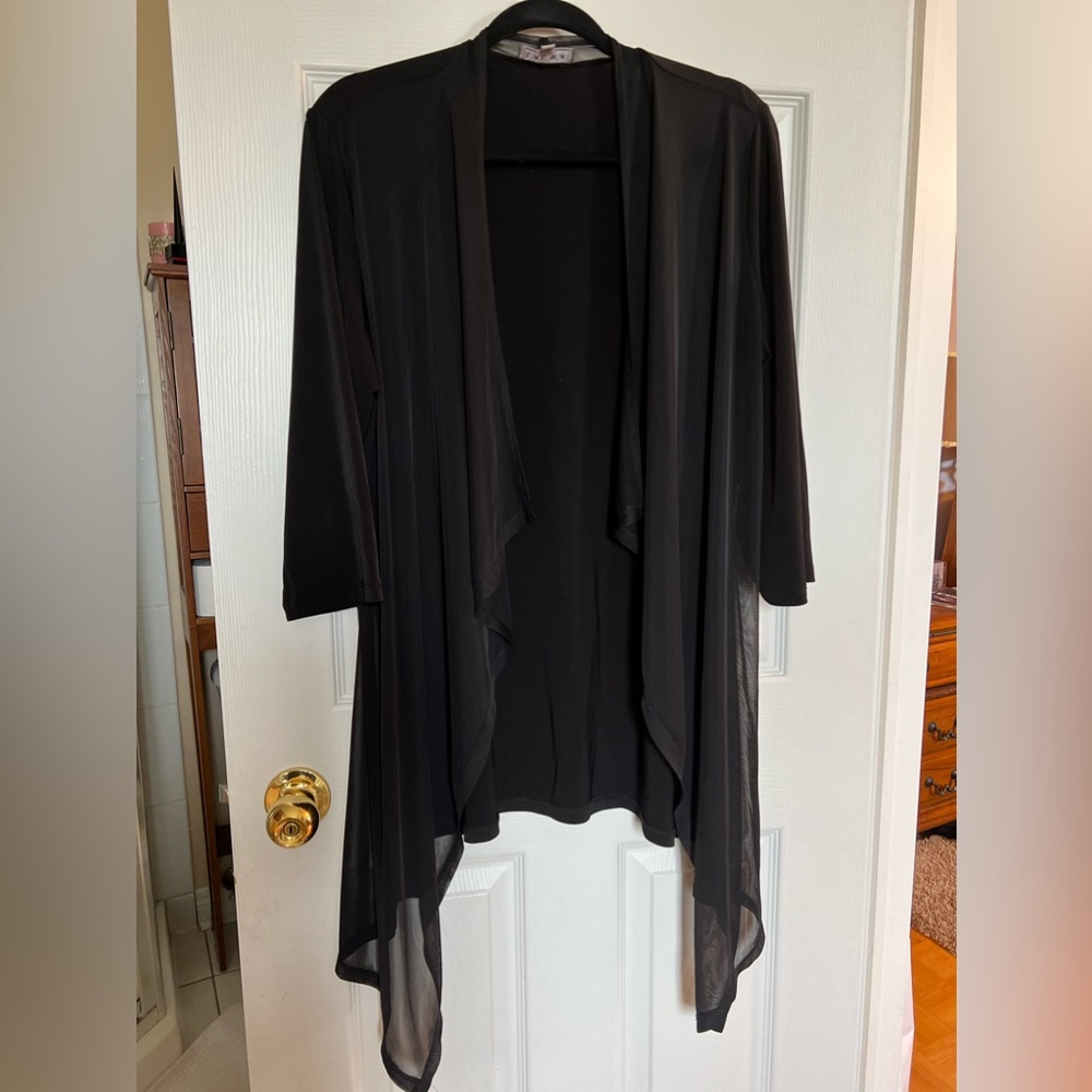 Black lightweight evening jacket.